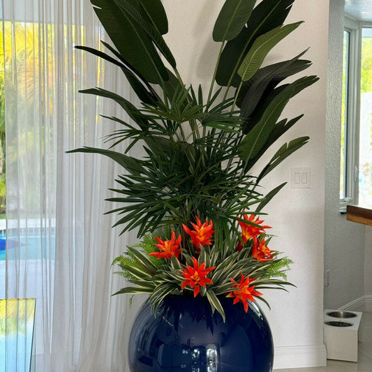 Mix of Tropical Plants in a Cobalt Blue Globe Planter